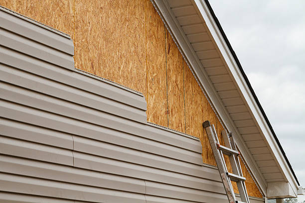 Professional Emergency Siding Repair technician working in Turin, GA
